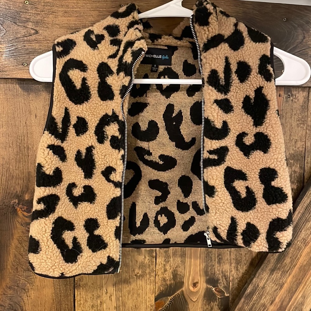 Girls size 8 animal print fuzzy zip up vest